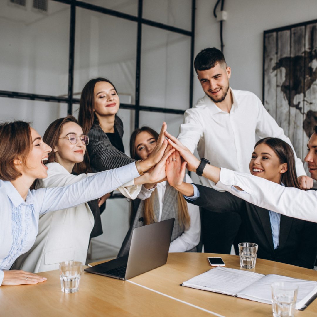 group-of-people-working-out-business-plan-in-an-office group-of-people-working-out-business-plan-in-an-office