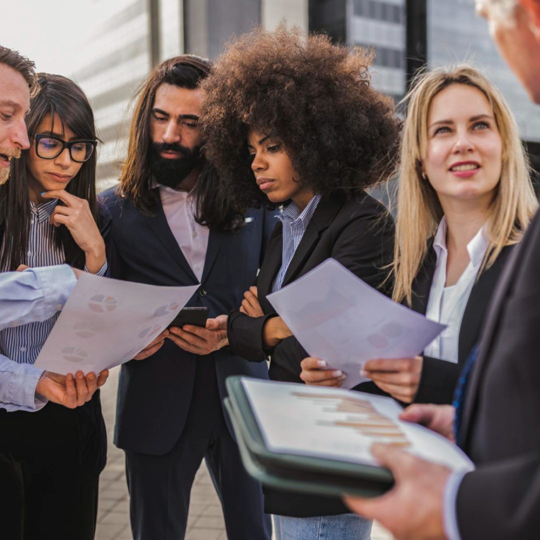 multiracial-diverse-entrepreneurs-discuss-and-meet-outdoors-focus-on-african-american-women